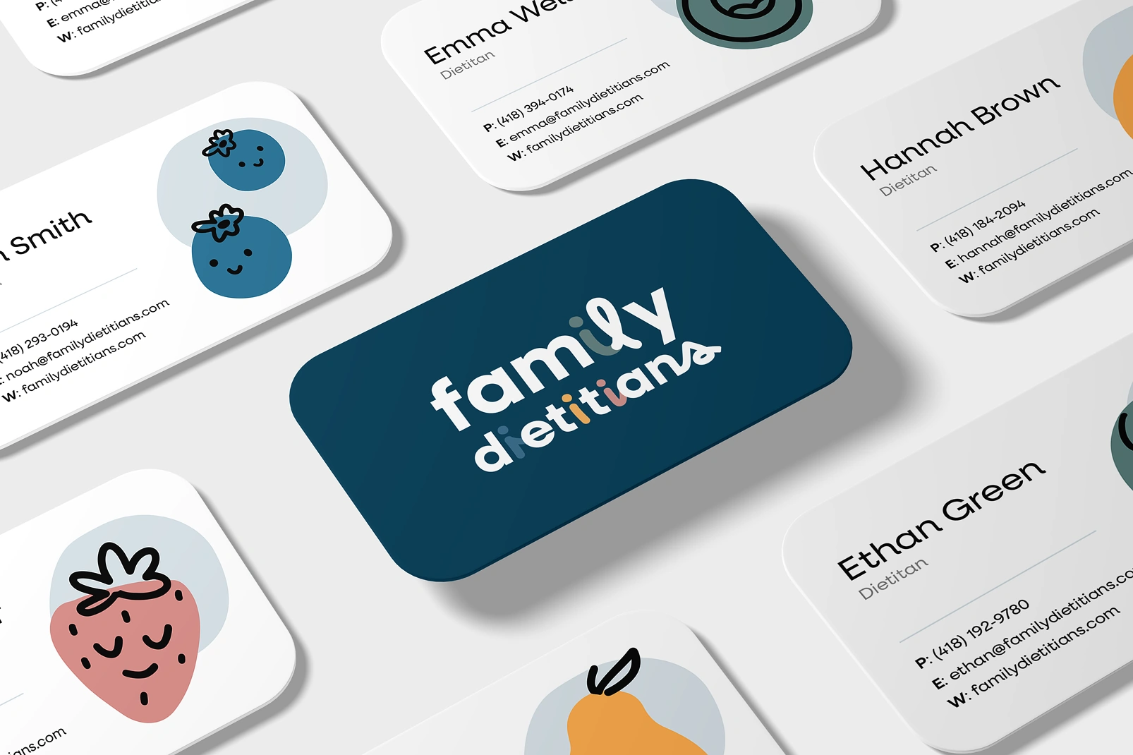 Collection of Family Dietitians business cards for each dietitian, each paired with a different fruit character, around a navy logo card
